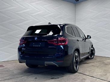BMW iX3 — photo 10