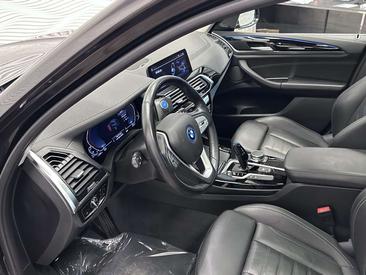 BMW iX3 — photo 27