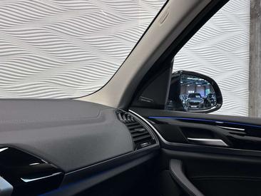 BMW iX3 — photo 38