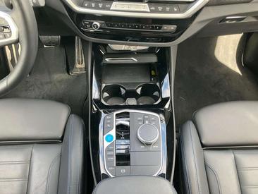 BMW iX3 Impressive — photo 8
