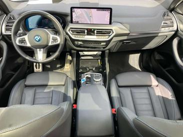 BMW iX3 Impressive — photo 9