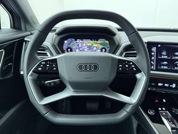 Audi Q4 E-tron Advanced 45 TFSI — photo 9