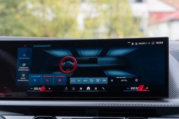 BMW XM 50e — photo 26
