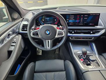 BMW XM 50e — photo 10