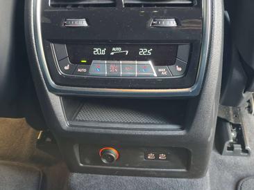 BMW XM 50e — photo 23