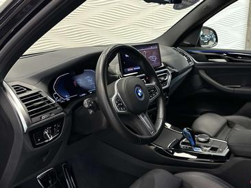 BMW iX3 M Sport — photo 26