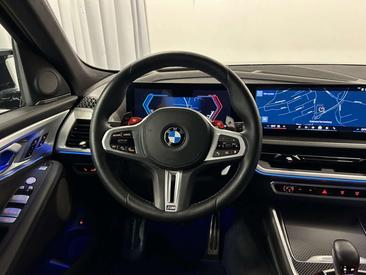 BMW XM 50e — photo 9