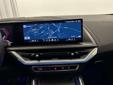 BMW XM 50e — photo 10