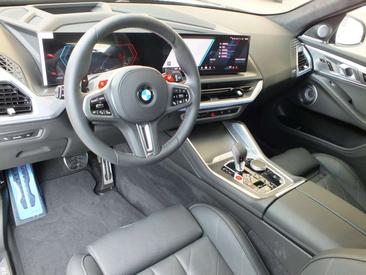 BMW XM 50e — photo 31