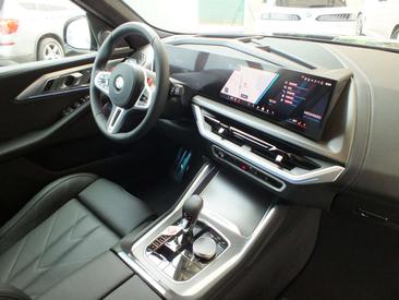 BMW XM 50e — photo 37