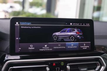 BMW iX3 — photo 25