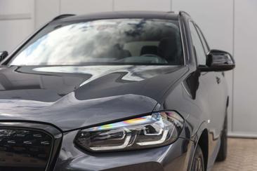 BMW iX3 — photo 30