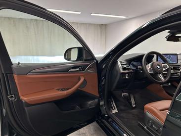 BMW X4 M M Competition — photo 30
