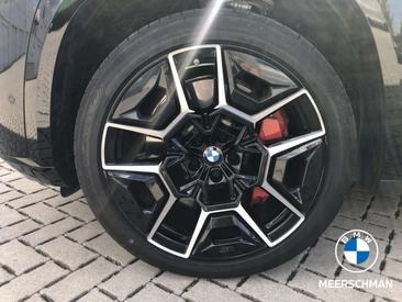 BMW XM 50e — photo 8