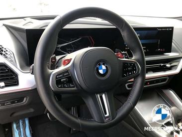 BMW XM 50e — photo 16