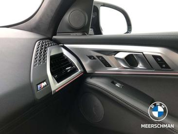 BMW XM 50e — photo 23
