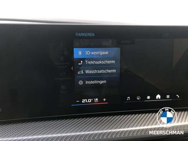 BMW XM 50e — photo 28