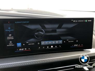 BMW XM 50e — photo 29