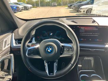 BMW IX1 M Sport — photo 25