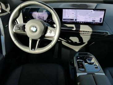 BMW IX XDrive45 — photo 28