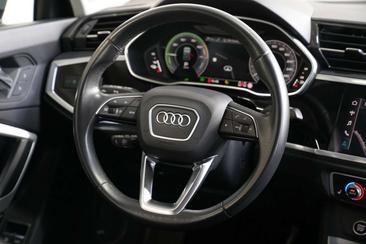 Audi Q3 45 TFSI E — photo 19
