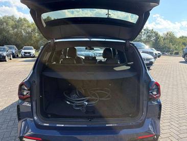 BMW iX3 — photo 11
