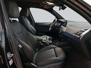 BMW iX3 — photo 11