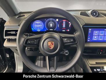 Porsche Macan I 4 Electric — photo 19