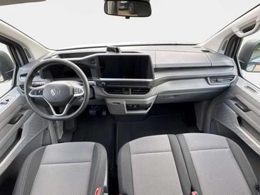 Volkswagen Caddy — photo 6