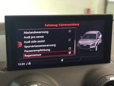 Audi Q2 30 TDI — photo 19