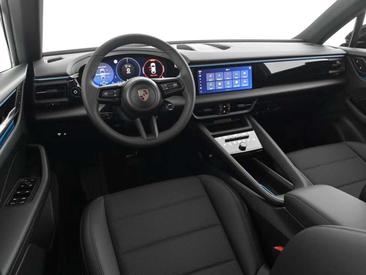Porsche Macan I Electric — photo 20