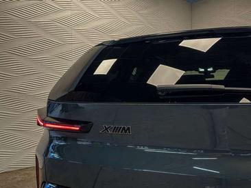 BMW XM 50e — photo 11