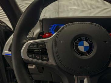 BMW XM 50e — photo 21