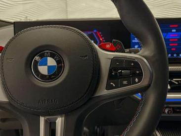 BMW XM 50e — photo 23