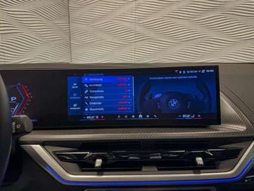 BMW XM 50e — photo 29