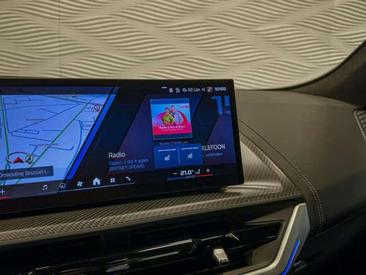 BMW XM 50e — photo 35