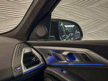 BMW XM 50e — photo 36