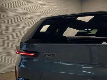 BMW XM 50e — photo 11