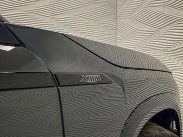 BMW XM 50e — photo 14