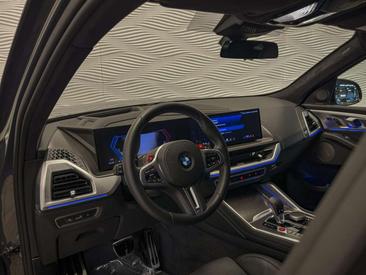 BMW XM 50e — photo 18