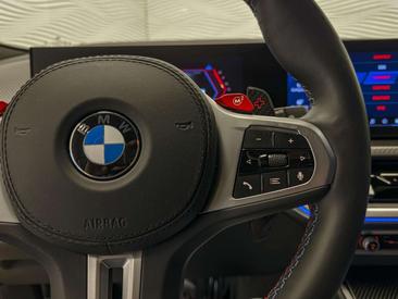 BMW XM 50e — photo 23