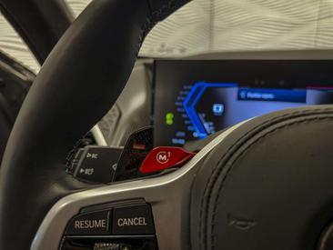 BMW XM 50e — photo 24