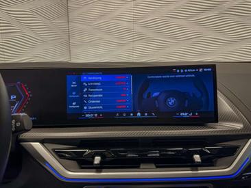 BMW XM 50e — photo 29