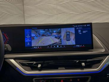 BMW XM 50e — photo 32