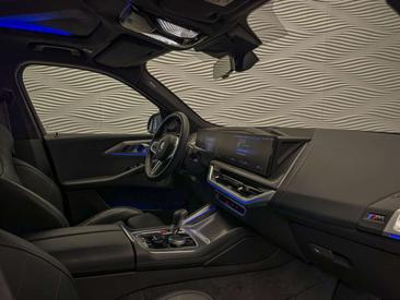 BMW XM 50e — photo 40