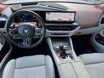 BMW XM 50e — photo 11