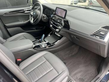 BMW iX3 — photo 10