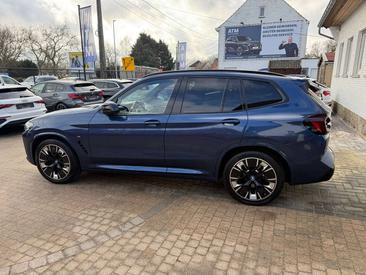 BMW iX3 — photo 25