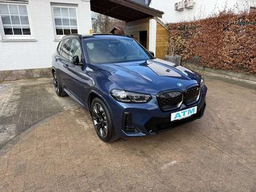 BMW iX3 — photo 28