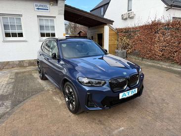BMW iX3 — photo 29